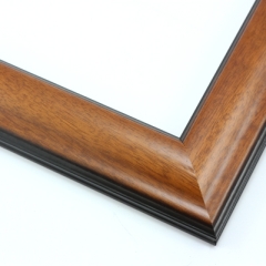This simple, reverse curve frame features a red-brown wash with a alight sheen, that highlights the natural wood grain.  The subtly bevelled inner and outer edges are matte black.

1.75 " width: ideal for small or medium size images.  The plain, natural appearance of this frame makes it a great border for almost any artwork: photograph, painting or giclee print.