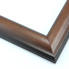 This simple, reverse curve frame features a walnut-wash, natural wood grain.  The subtly bevelled inner and outer edges are matte black.

1.75 " width: ideal for small or medium size images.  The plain, natural appearance of this frame makes it a great border for almost any artwork: photograph, painting or giclee print.