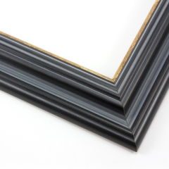 This stepped, reverse scoop frame with raised outer edge features a blue-grey wash that highlights the natural wood grain.  The recesses of the profile are a whiter shade, and cracked gold foil adorns the inner lip.

1.75 " width: ideal for medium size images.  A wide variety of photographs, paintings and prints will be enhanced within this unique frame.