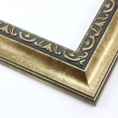This classic, Victorian-style frame features a solid wood, reverse scoop profile.  The relief-detailed inner lip and sloped face are a textured gold foil, edged in a subtle bevel.

2 " width: ideal for medium size images. Border an acrylic or oil painting or print with this antiqued, high fashion frame.