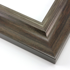 This elegant frame has a double scoop profile.  The outer, wider scoop brings out the natural wood in gray-brown. The inner lip features a subtle silver foil finish that maintains the wood grain.

2.5 " width: ideal for large and extra large (oversize) images. Border a bold watercolour or oil painting, or your favourite print, in this stylish, classic frame.