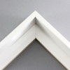 Classic 1-1/2 " floater frame. This frame is a solid true white with a high gloss finish. A slight horizontal grain pattern is visible in only certain light and viewing angles.