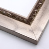 This flat profile, solid wood frame features a high scroll and dot relief design topped with silver leaf, along the inner edge.  The wide surrounding edge mimics brushed silver.

2.5 " width: ideal for larger images.  Highlight a traditional black and white photograph, oil painting or Giclée print.  The extension of the flat outer edge beyond the relief detail ensures the frame will not detract from your image.