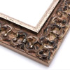 This ornate, intricate frame features a bold relief design in gold and black-mottled, antique silver foil, to match the raised, roughly textured silver foil inner lip.

2.75 " width: ideal for large images.  Select a strong piece of artwork to avoid having it overpowered by this decadent frame.