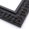 This ornate, intricate frame features a bold relief design in a dusty antiqued black. The face matched the roughly textured, raised inner lip as well.

2.75 " width: ideal for large images.  Select a strong piece of artwork to avoid it being overpowered by this decadent frame.