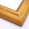 This high swan profile wood frame features a reverse slope and 1.5 " maximum depth.  The gentle ridges are encased in glossy gold foil, and gentle distressing reveals a burnished, deep red undercoat.  It is an elegant but simple design.

2.5 " width: ideal for medium and large images.  Pair with old, grayscale portraits and bold paintings or Giclée prints.