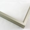 Tall, yet slim 7/16 " metal frame with a hooked profile. This moulding is dark grey silver with a slight brushed texture. It reflects diluted light.

Nielsen n117-14 Profile