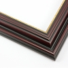 This stepped, reverse scoop frame with raised outer edge features a mahogany wash that maintains the natural wood grain.  The recesses of the profile are matte black, with a cracked gold foil on the inner lip.

1.75 " width: ideal for medium size images.  A wide variety of photographs, paintings and prints will be enhanced within this unique frame.