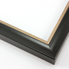 This simple, bold frame features scoop profile and matte black face with subtle crosshatching.  The inner lip is stepped down and covered in distressed bronze foil.

1.25 " width: ideal for small or medium size artworks. Due to it