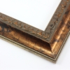 This classic, Victorian-style frame features a solid wood, reverse scoop profile.  The relief-detailed inner lip and sloped face are a mottled bronze foil, edged in a subtle bevel.

2 " width: ideal for medium size images. Border an acrylic or oil painting or print with this antiqued, high fashion frame.
