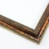 This classic, Victorian-style frame features a solid wood, reverse scoop profile.  The relief-detailed inner lip and sloped face are a mottled bronze foil, edged in a subtle bevel.

1.25 " width: ideal for small images. Border an acrylic or oil painting or print with this antiqued, high fashion frame.