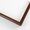 This 1/2 " frame features a scooped profile from a flat outer edge. Along with walnut finish and delicate wood grain detailing creating horizontal lines across the scooped profile. The sides of the frame features a matte black finish.

1/2 " width: ideal for small artwork. This modern frame is suitable for a wide variety of art mediums, from photographs to paintings and giclee prints.